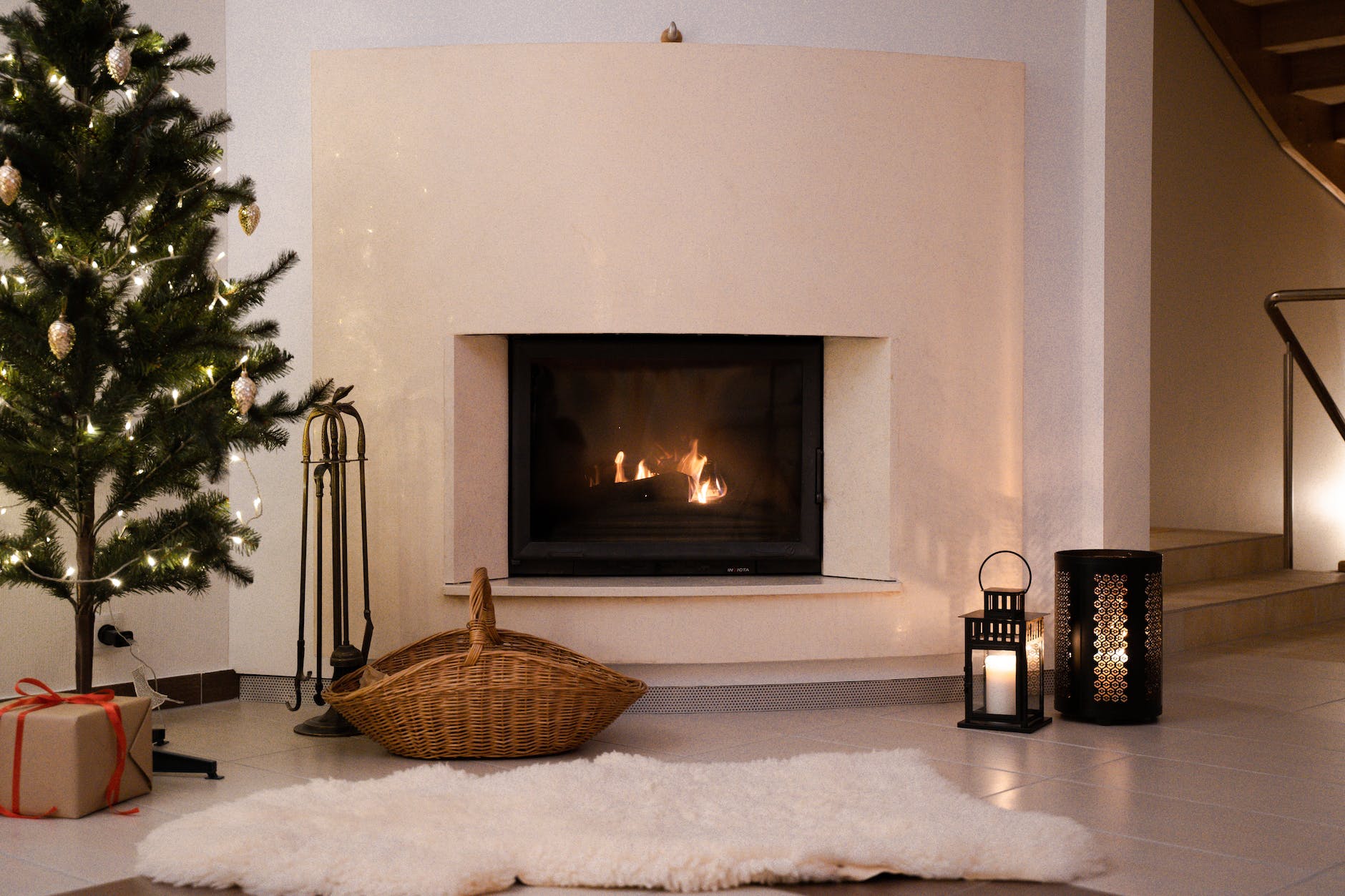 green christmas tree near the fire place