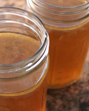 Close up picture of bone broth in mason jars