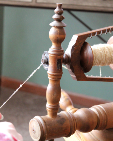 Closeup of the process of spinning yarn