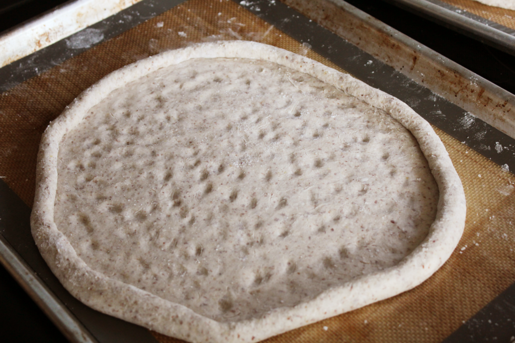 Rolling out your gluten free pizza crust. 