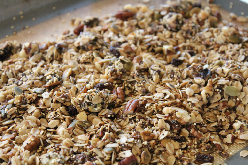 Granola closeup on a baking sheet.