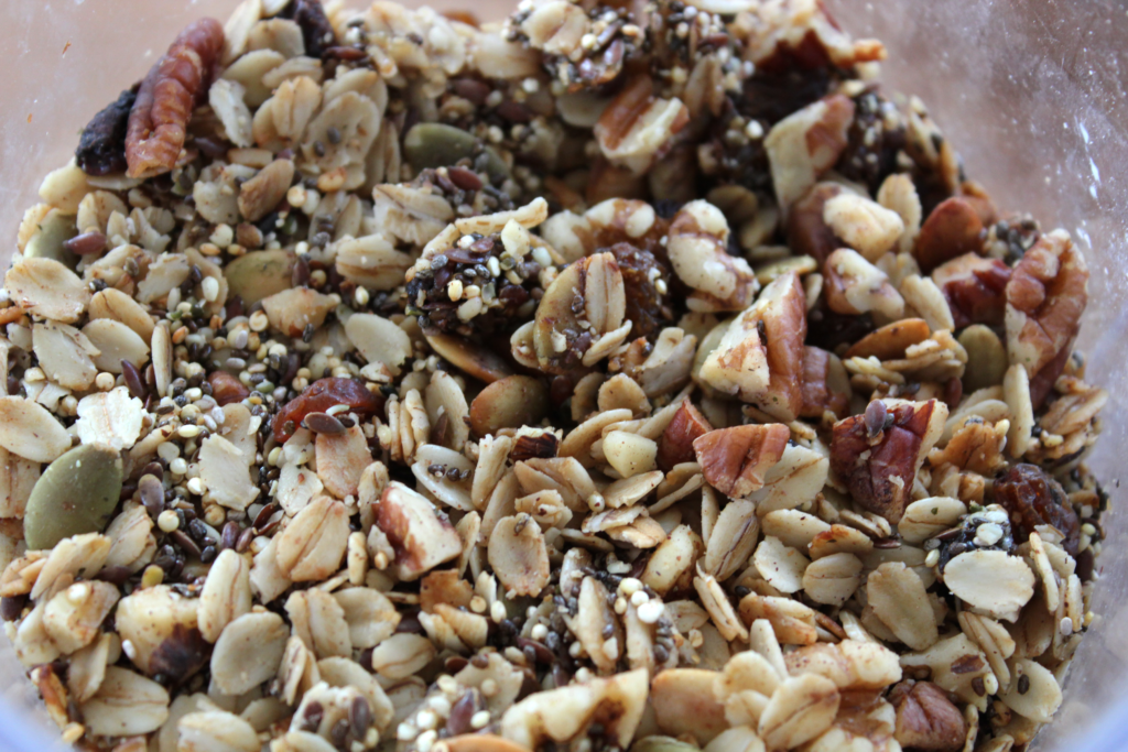 Closeup of homemade granola in a container.