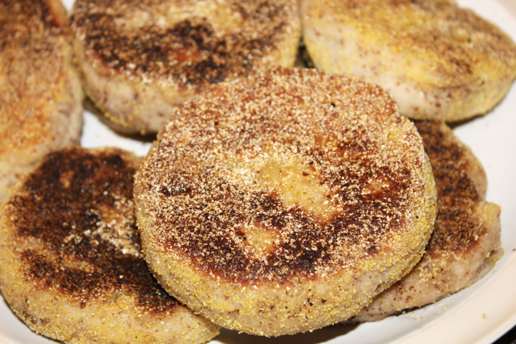 Close up of english muffins pile on a plate