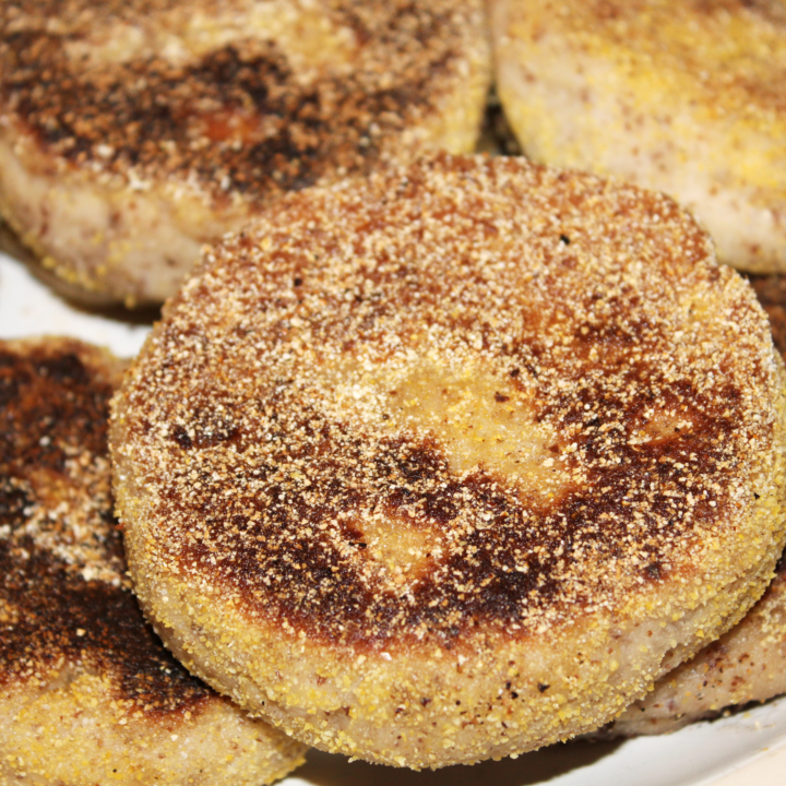 Close up of english muffins pile on a plate